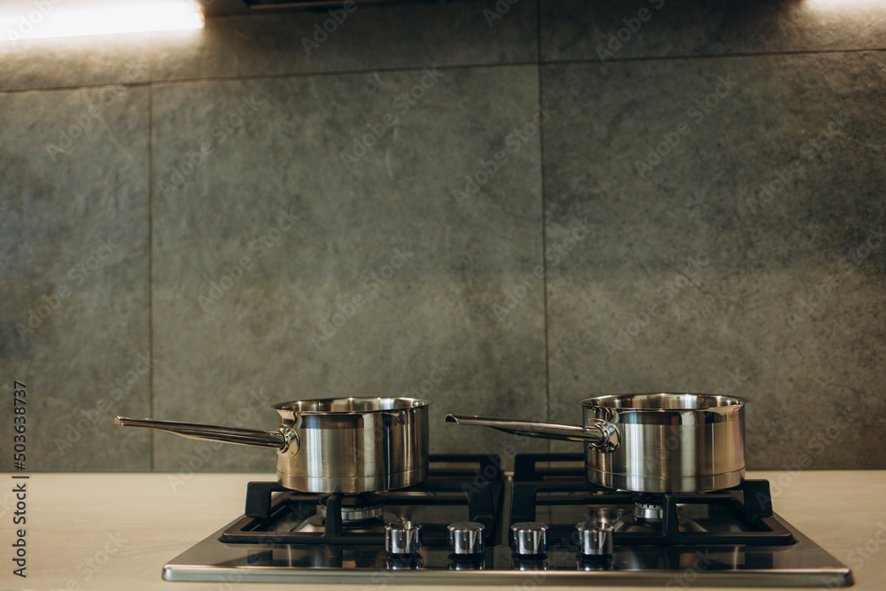 Pot on the gas Stove and Cooking in Kitchen Pot on the gas Stove and Cooking in Kitchen