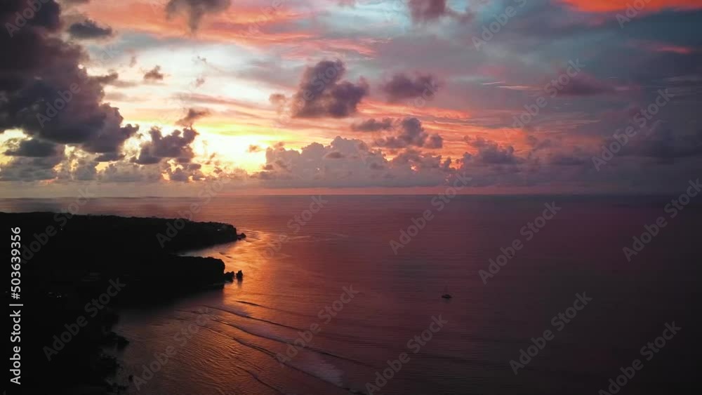Beautiful Bingin beach with exotic cliffs houses and hotel located in Bali, Indonesia. This drone footage was shot during Sunset time. Beautiful Bingin beach with exotic cliffs houses and hotel located in Bali, Indonesia. This drone footage was shot during Sunset time.