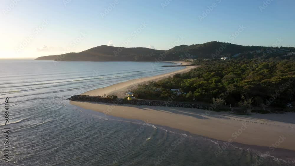 Noosa Heads sunrise aerial with beach, river mouth, waves. Sunshine Coast, Queensland Noosa Heads sunrise aerial with beach, river mouth, waves. Sunshine Coast, Queensland