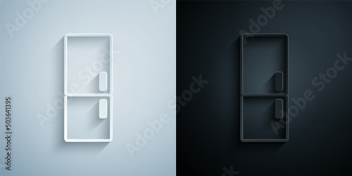 Paper cut Refrigerator icon isolated on grey and black background. Fridge freezer refrigerator. Household tech and appliances. Paper art style. Vector