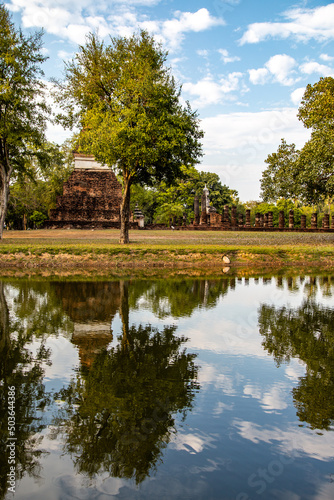 Wat Traphang Ngoen temple and buddha in Sukhothai historical park, Thailand photo