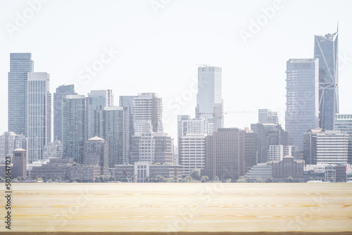 Empty tabletop made of wooden dies with San Francisco city view at daytime on background  template