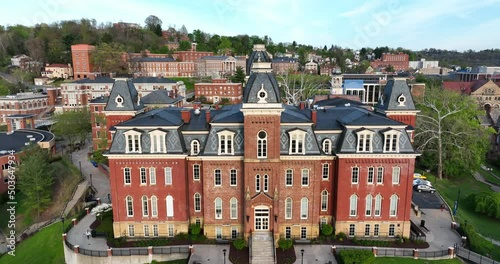 West Virginia University, WVU Woodburn Hall. Rising aerial reveal at golden hour. Public land grant college in WV, USA. photo