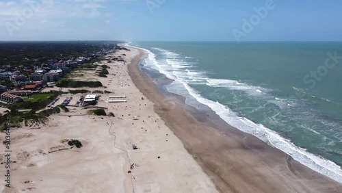 Beautiful Aerial Drone Shot of Carilo Beach and Village. photo