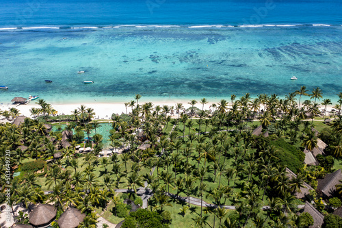 Aerial view Flic en Flac beach with luxury hotel and palm trees, Mauritius, Africa