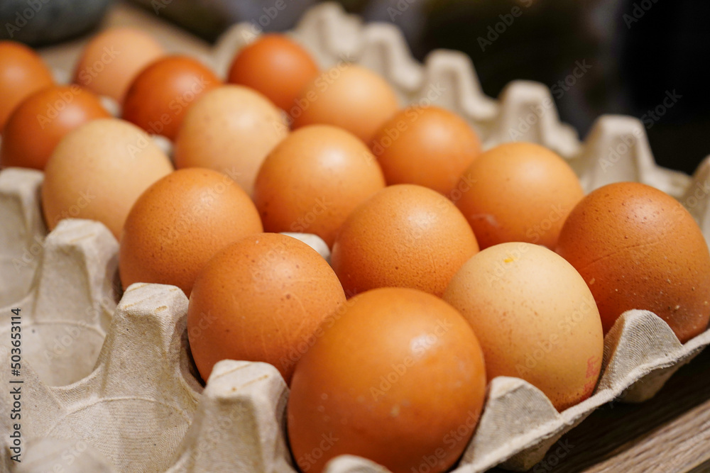 Close up of lots of eggs in a carton