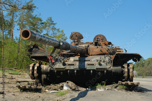 Destroyed tank near Makariv. War in Ukraine concept photo