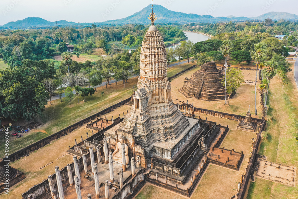 Aerial view of Wat Phra Sri Rattana Mahathat Rajaworaviharn temple and buddha in Si Satchanalai historical park, Thailand