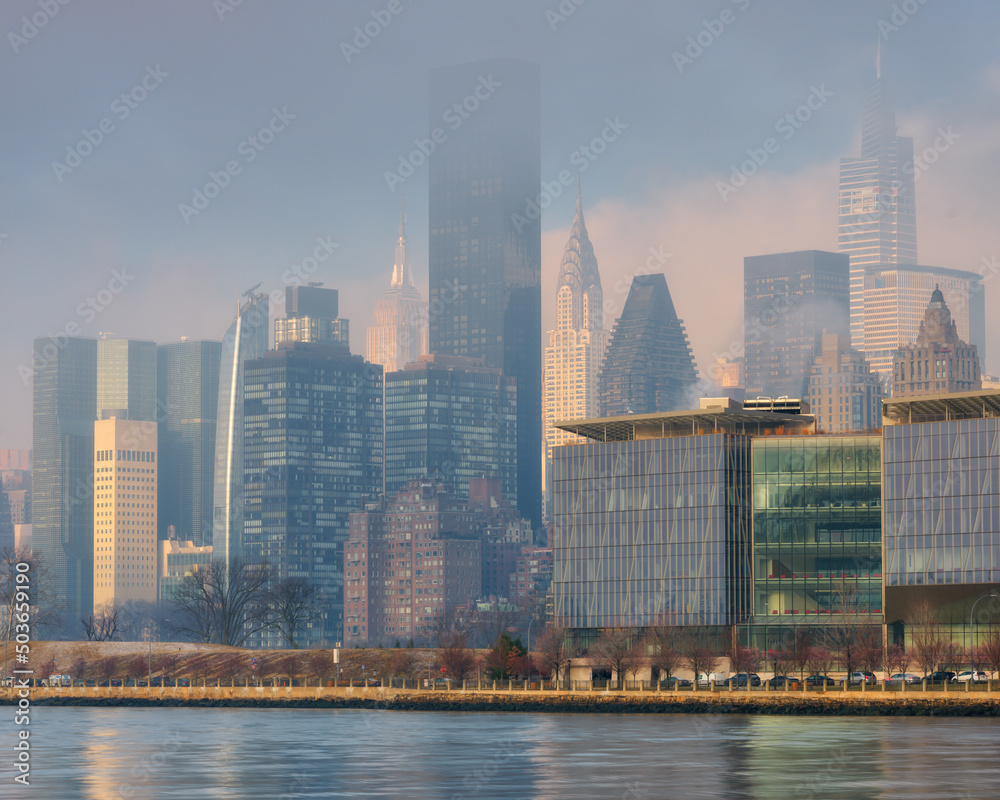 Midtown Manhattan view from East river at sunrise