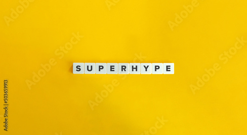 Superhype Word on Letter Tiles on Yellow Background. Minimal Aesthetics.