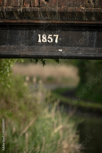 Abstract shot of an old canal bridge built in 1857 in the UK photo