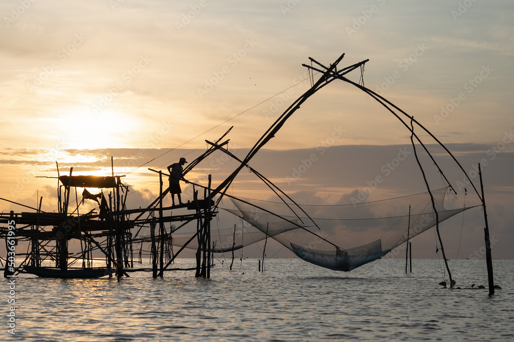 Yor Building, Local fishing with big net, at Thale noi, Phatthalung,  Thailand Stock Photo