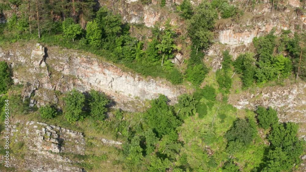 Ural Mountains, Bashkiria, Kyzyltash rocks and Kalim-Uskan rock. Aerial view. Ural Mountains, Bashkiria, Kyzyltash rocks and Kalim-Uskan rock. Aerial view.