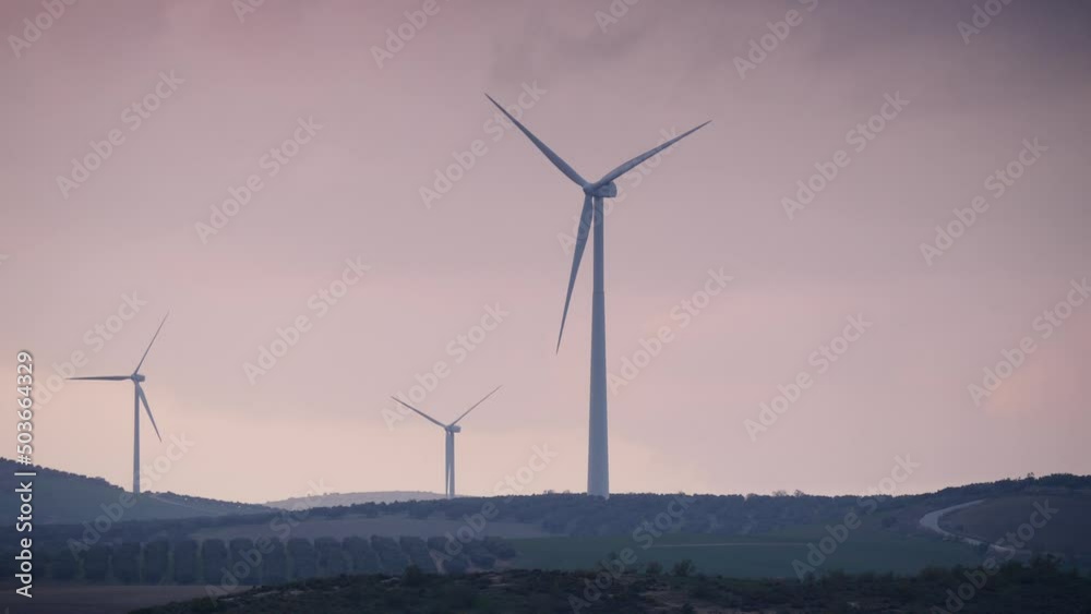Wind turbine farm on hills. Green ecological power energy generation near Ardales, province Malaga, Andalusia Spain. Wind turbine farm on hills. Green ecological power energy generation near Ardales, province Malaga, Andalusia Spain.