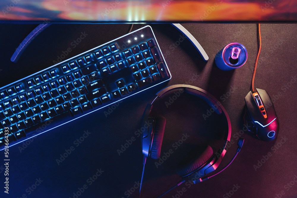 Close-up of black desktop with professional gaming and streaming setup ...