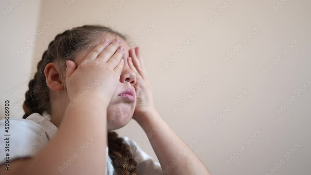 sad girl sitting in the corner crying a covered her face with her hands. family violence abuse child concept. parents indoor punished the child put in a corner. child in depression crying lifestyle sad girl sitting in the corner crying a covered her face with her hands. family violence abuse child concept. parents indoor punished the child put in a corner. child in depression crying lifestyle