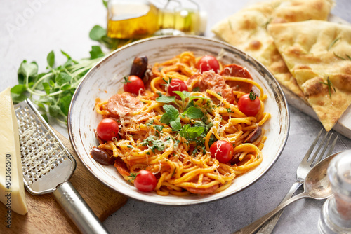 Tasty appetizing pasta served with tomato sauce