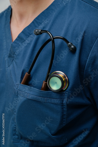 Medical stethoscope. Brown medical stethoscope.A doctor with a stethoscope.A doctor holding a stethoscope