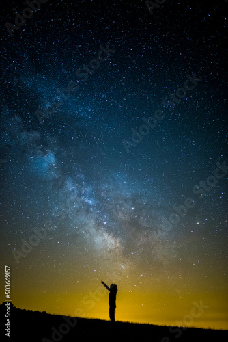 Milky way and girl in Serra Del Montsec, Lleida, Spain