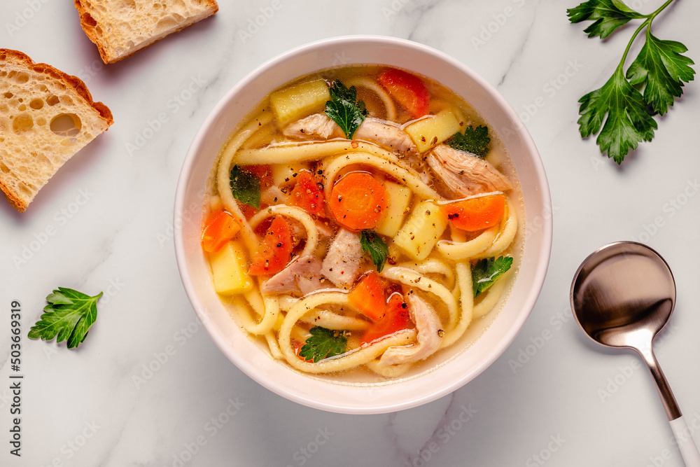 Chicken soup with noodles and vegetables