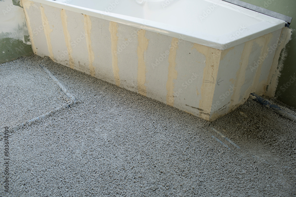 Construction site of attic conversion in the phase of floor screed fill and drywall is already in place and already partially spackled Construction site of attic conversion in the phase of floor screed fill and drywall is already in place and already partially spackled