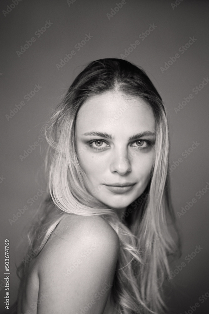 Young beautiful blonde girl with smoky eye makeup