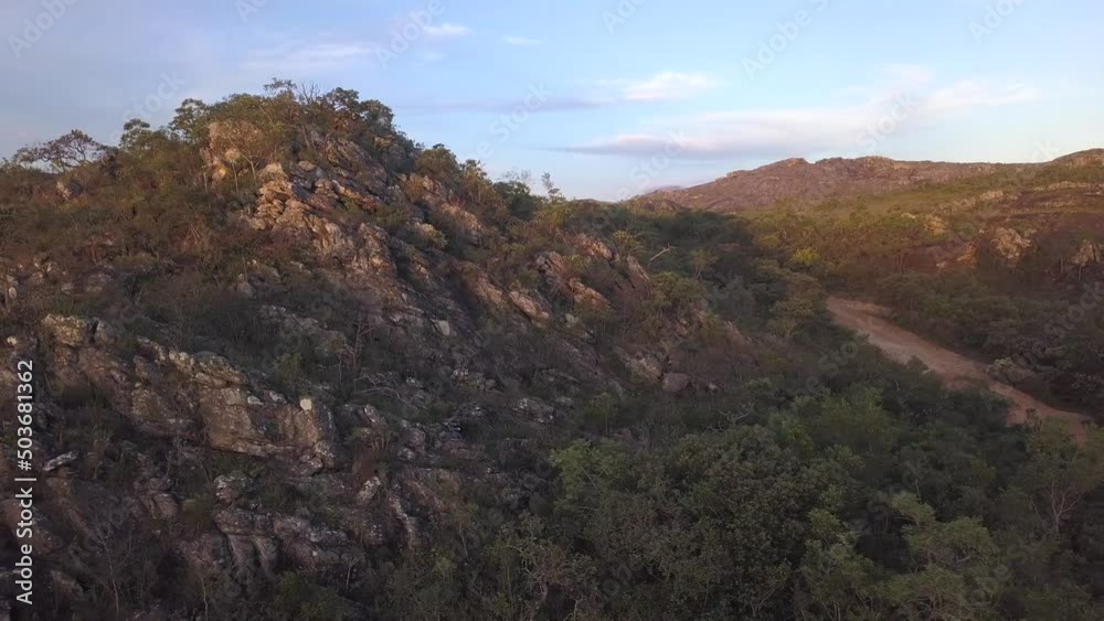 Beautiful drone aerial view of road on stone mountain in Minas Gerais, Brazil. Concept of nature, travel, tourism, ecology, environment, landscape. 4K