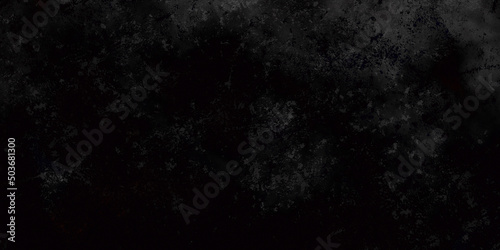 Black stone texture. Chalkboard, metallic abstract texture background. Classic studio background. Background or design art work. Smoke on a black background, the light in the smoke. Black grunge