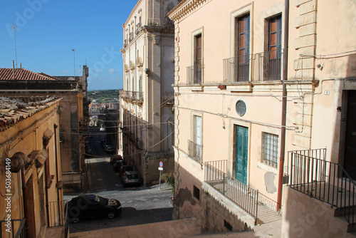 street and flat buildings in noto in sicily (italy) © frdric