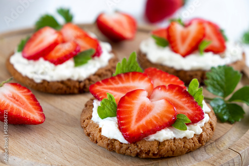 Homemade healthy toast with strawberry and cream cheese. Tasty breakfast. Clean eating, dieting or recipe of healthy snack sandwich for vegaterian.