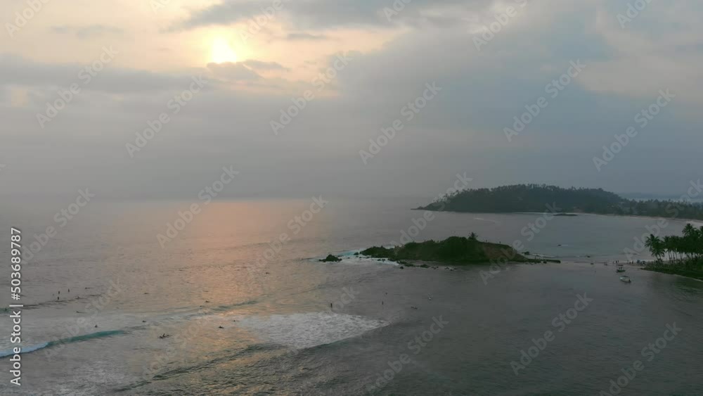 Mirissa water front during sunset by drone in Sri Lanka. Mirissa water front during sunset by drone in Sri Lanka.