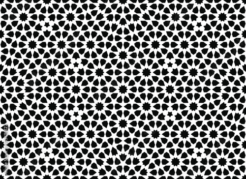 Seamless geometric ornament based on traditional islamic art. Black and white.
