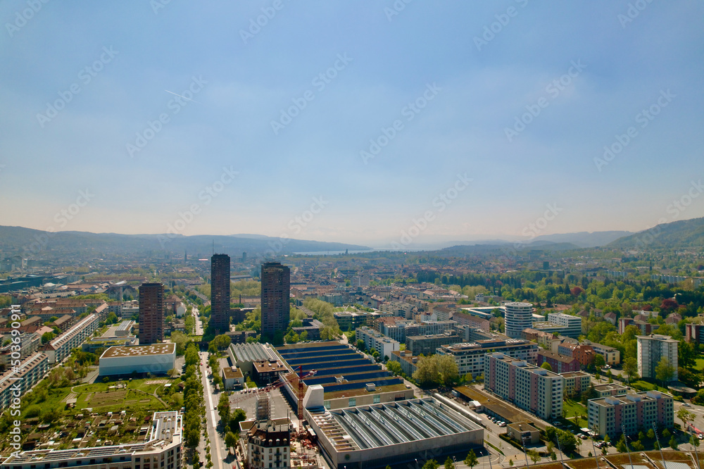 Aerial view of City of Zürich on a sunny spring day with blue cloudy sky background. Photo taken April 28th, 2022, Zurich, Switzerland.
