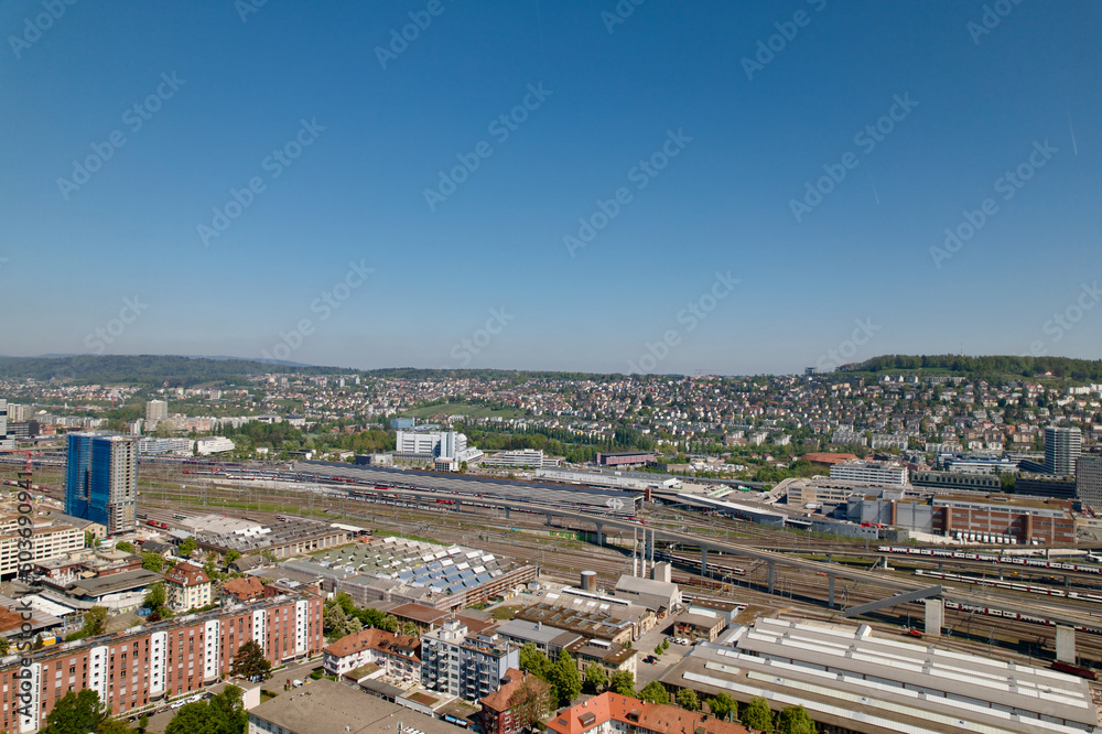 Aerial view of City of Zürich on a sunny spring day with blue cloudy sky background. Photo taken April 28th, 2022, Zurich, Switzerland.