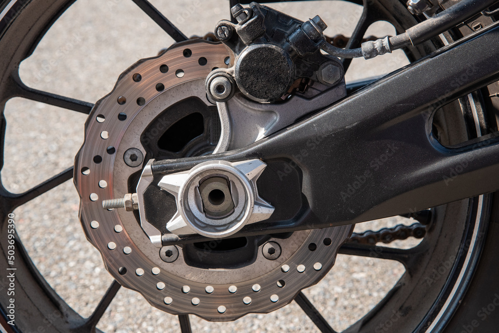 Obraz premium Motorbike rear wheel brake and brake disc