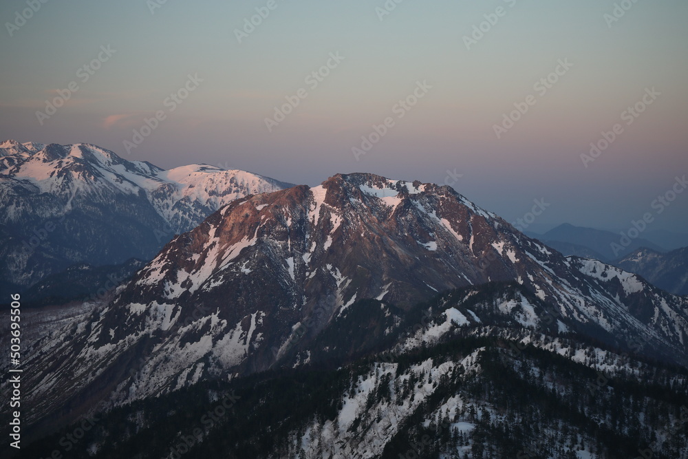 Mt. Norikura and Mt. Yakedake in the Northern Alps of Japan at dawn