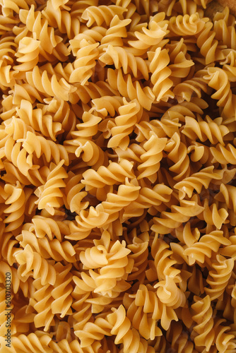 Traditional Italian fusilli pasta. Dry uncooked pasta.