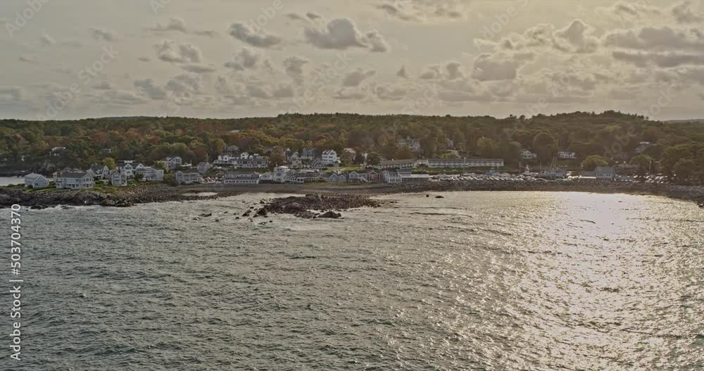 Ogunquit Maine Aerial v3 pan shot of coastal homes and rocky shores at