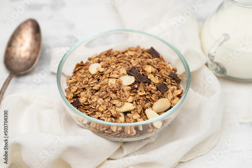 muesli with nuts and chocolate in th bowl