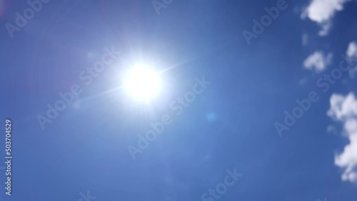 sun clouds traveling in blue sky background in spring season
