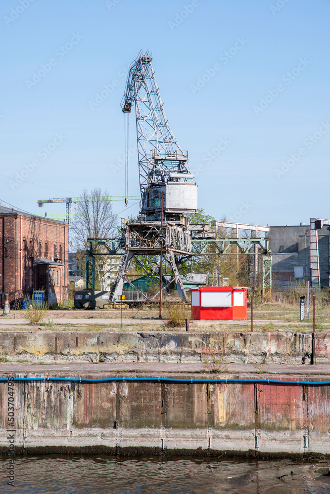 green giant cranes on the skylnie at the shipyard in gdansk poland