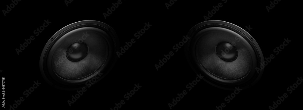 A pair of modern powerful sound speakers on a dark background. - obrazy, fototapety, plakaty 