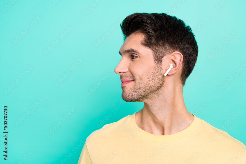 Fototapeta premium Profile photo of funny brunet young guy look promo wear t-shirt headphones isolated on teal color background
