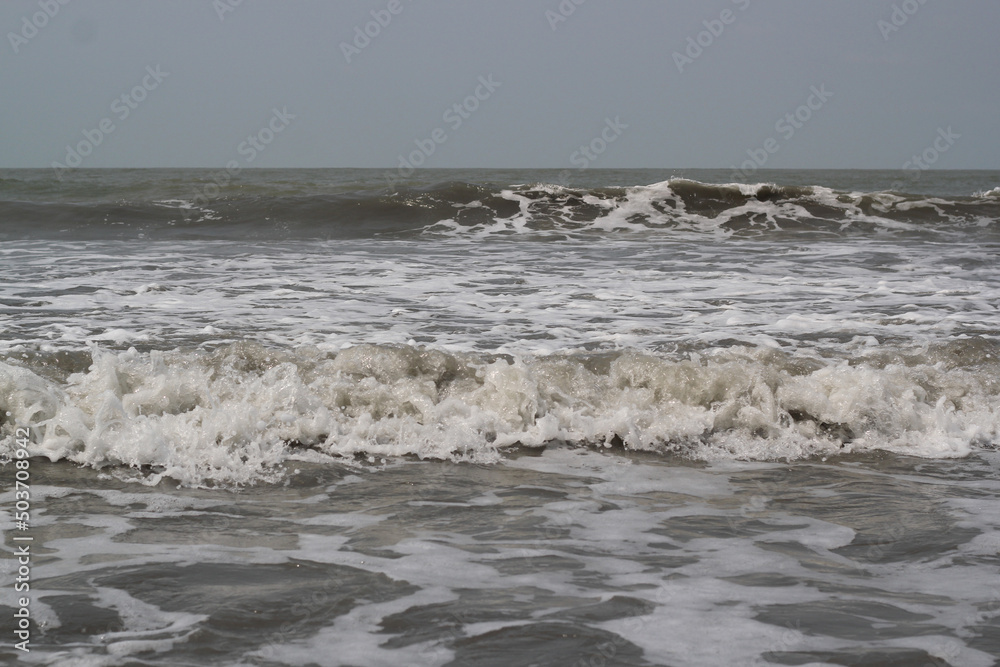 Sea wave on the sea beach