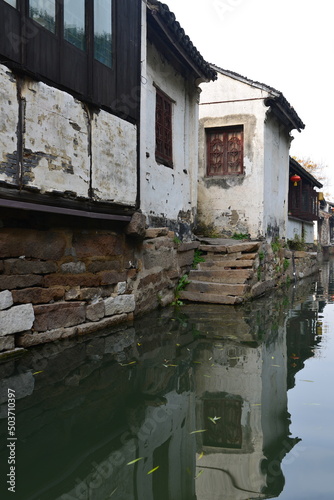 Canals, Stairs, and Traditional Chinese Buildings at Zhouzhuang Water Town, Jiangsu Province, China