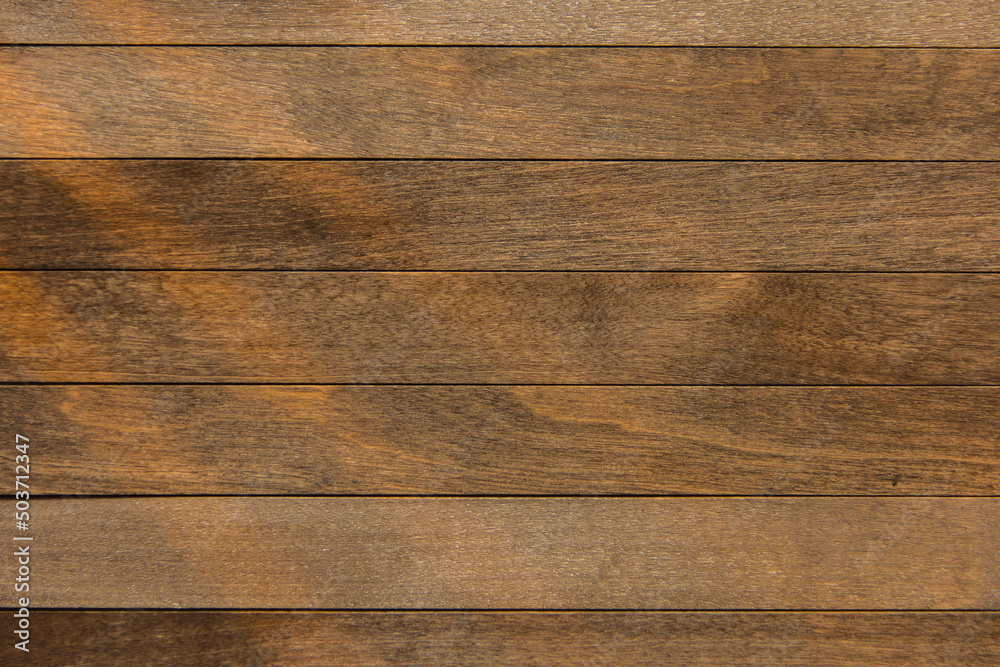 Wooden surface as background texture with rays of light. Wooden surface as background texture with rays of light.