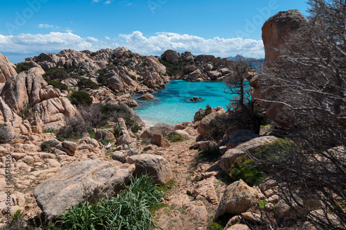 Tranquil scenery of the Spiaggia di Cala Coticcio tiny beach in Italy photo