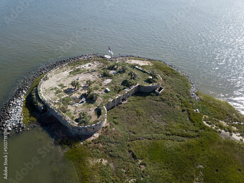 The ruins of Pinckney Castle, a civil war era fort in Charleston, Harbor, South Carolina photo