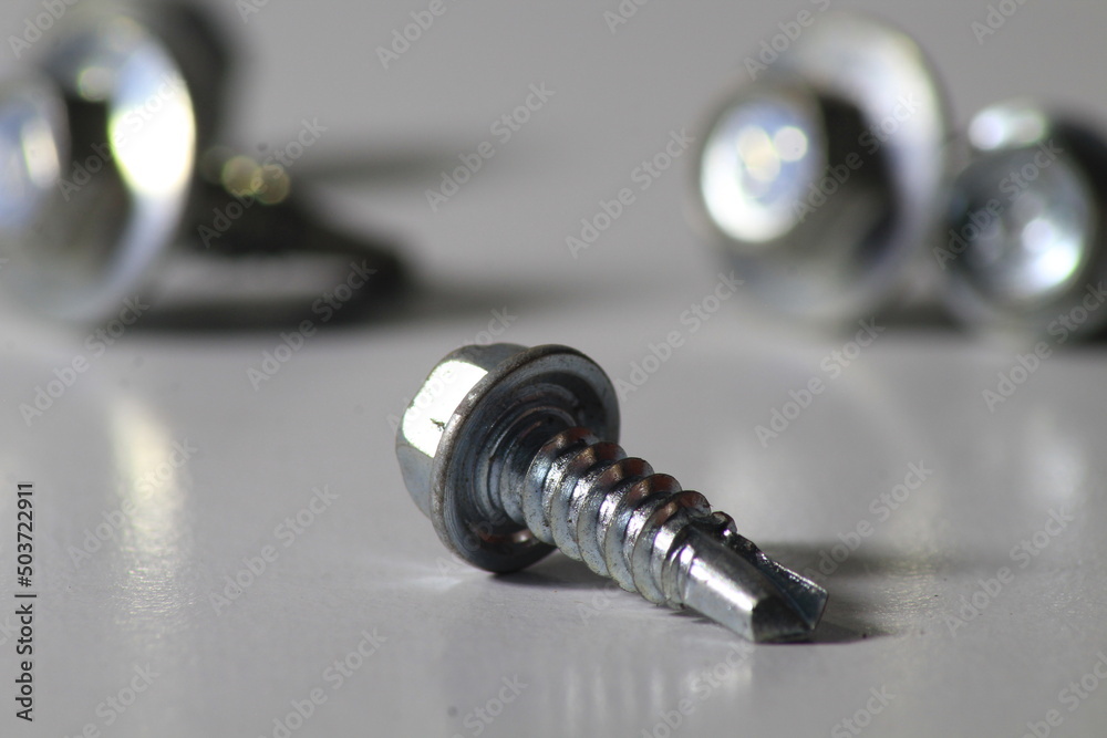 Close up bolt nails on a white background Close up bolt nails on a white background
