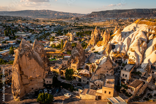 Landscape of buildings surrounded by rock formations in Goreme, Cappadocia, Turkey